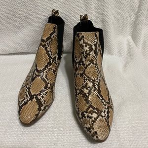 Qupid  booties.  Size 9. Never worn. Snake skin look